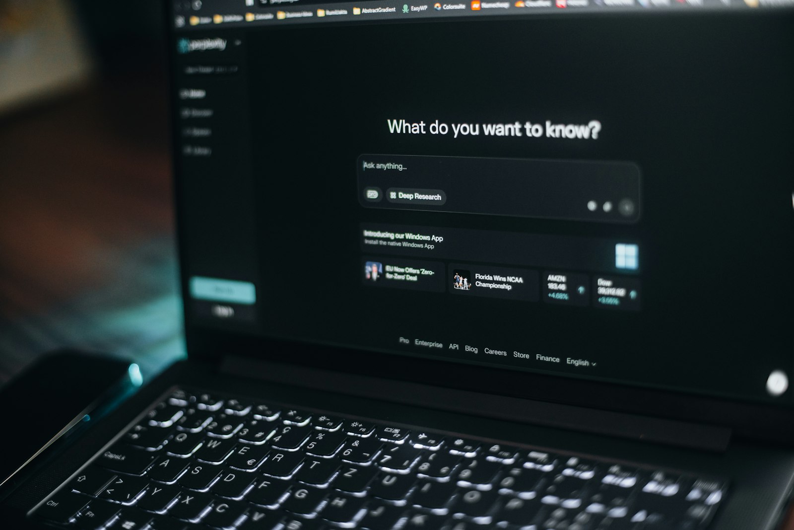 A laptop screen showing a search bar